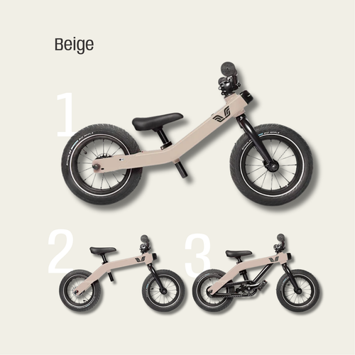 Beige balance bike with black wheels on a light beige background